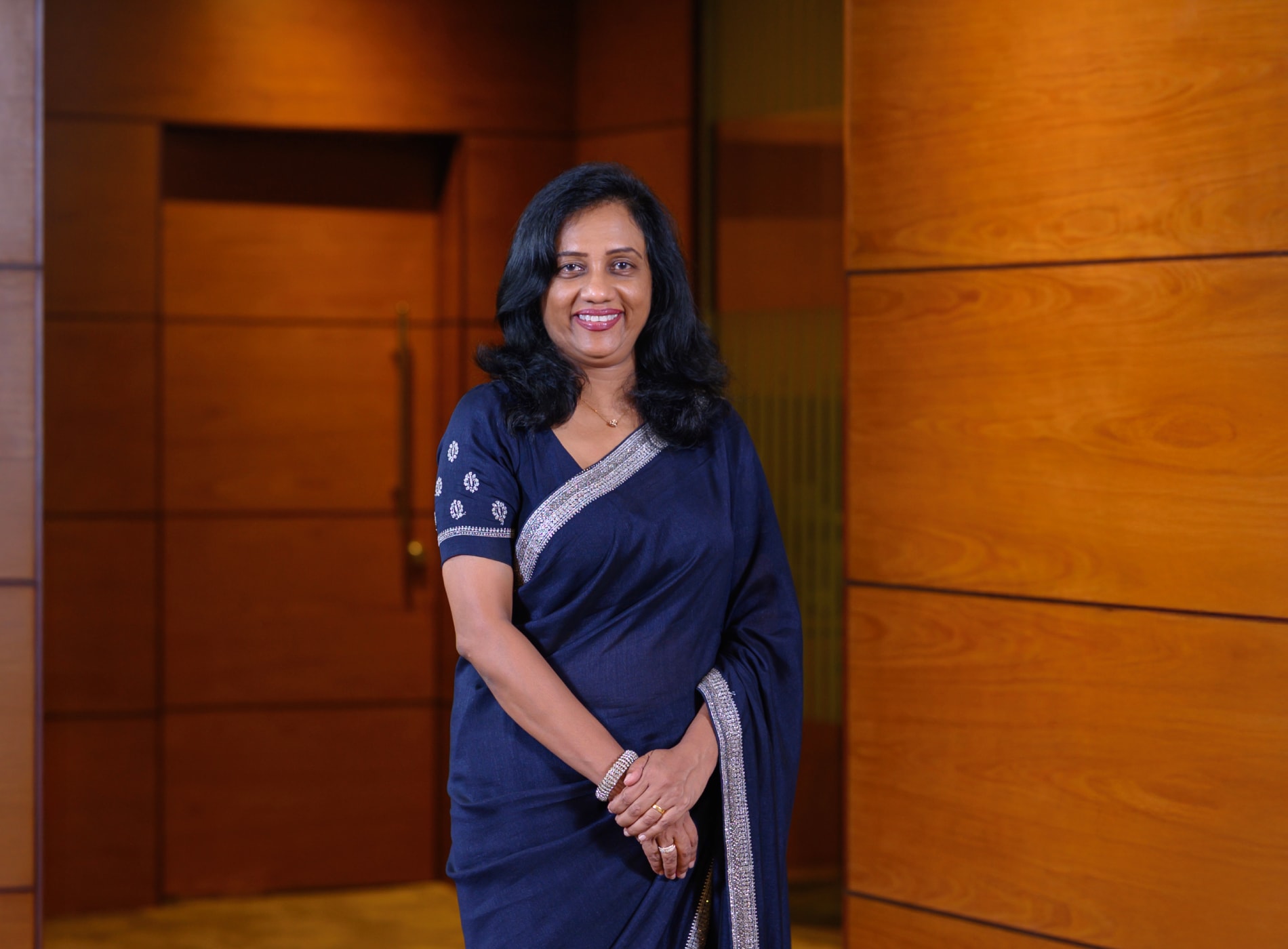 Portrait of Ms. Aruni Liyanagunawardana, Deputy General Manager – Retail Banking & Overseas Customer Services, People's Bank